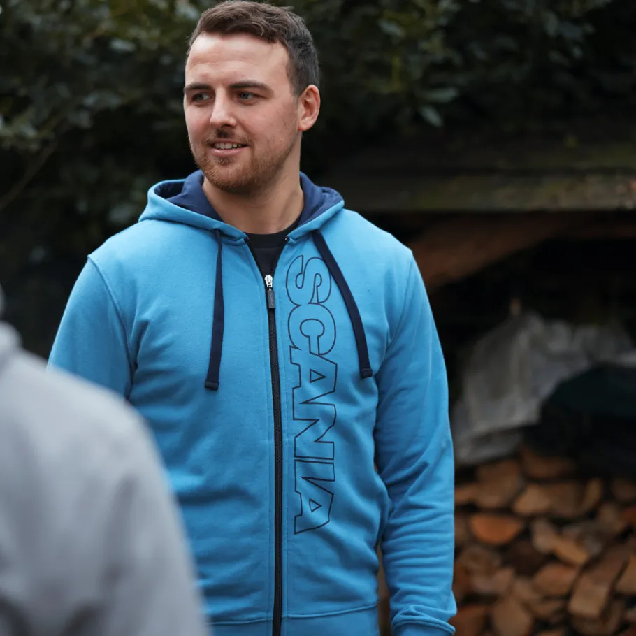 ljusbl_bashuvtrja_med_dragkedja_herr_1.webp Scania Tröjor & Hoodies | Ljusblå bashuvtröja med dragkedja – herr